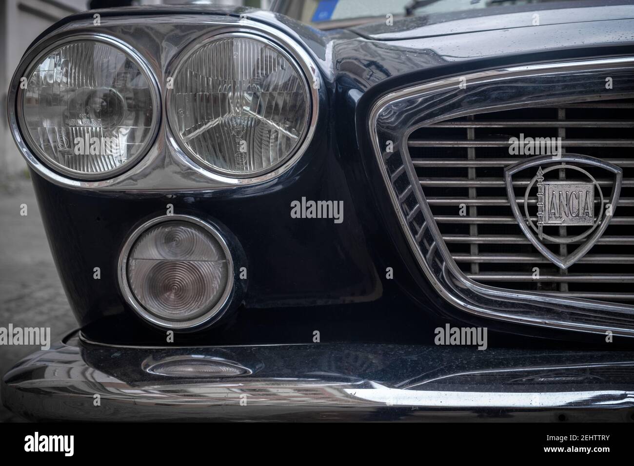 Lancia Flavia Coupe 1966 vintage model radiator grille with emblem lights and bumper detailed view Stock Photo