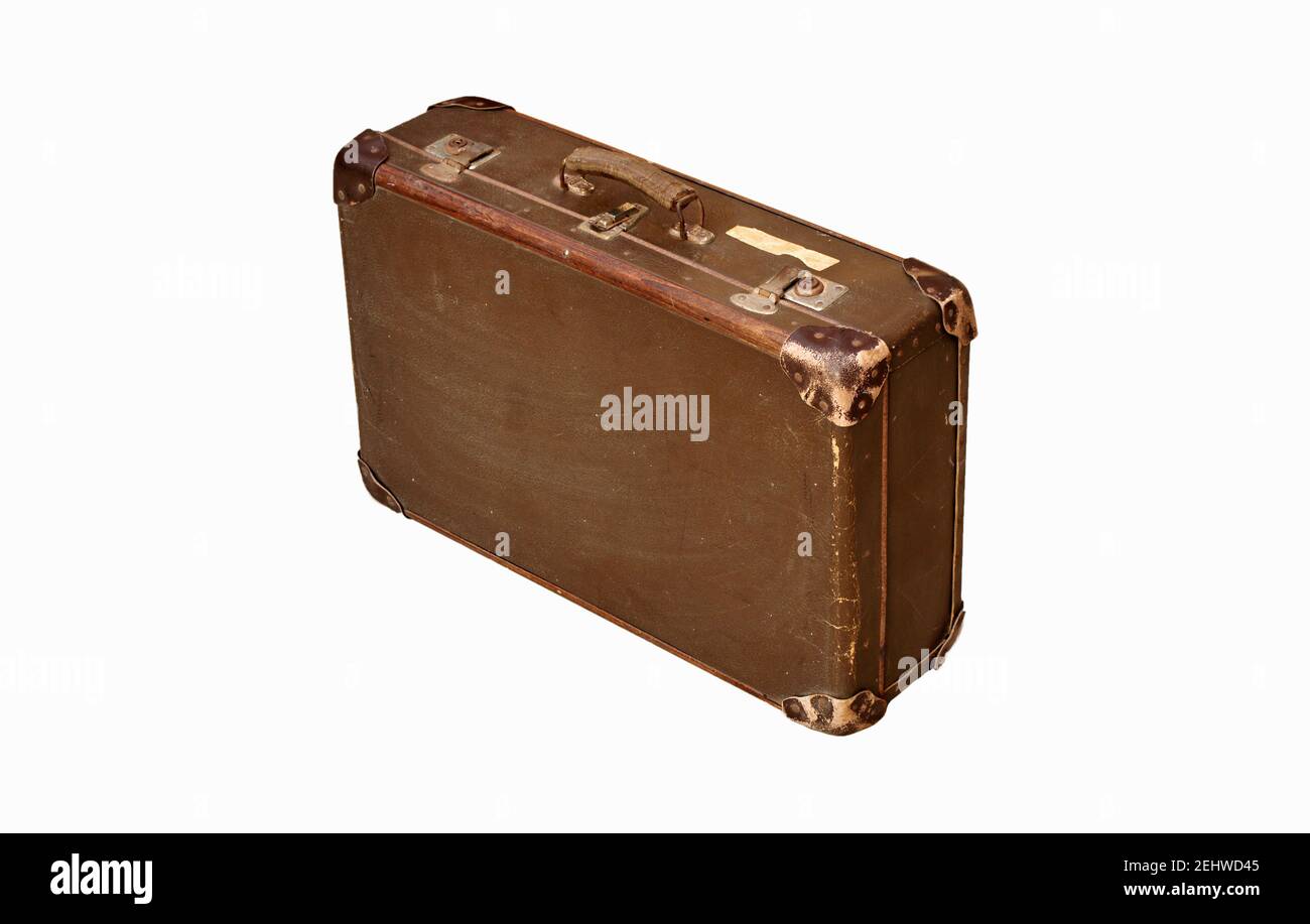 Old leather brown vintage travel suitcase isolated on white background.  Symbol and concept of travel. Adventure time. Stock Photo