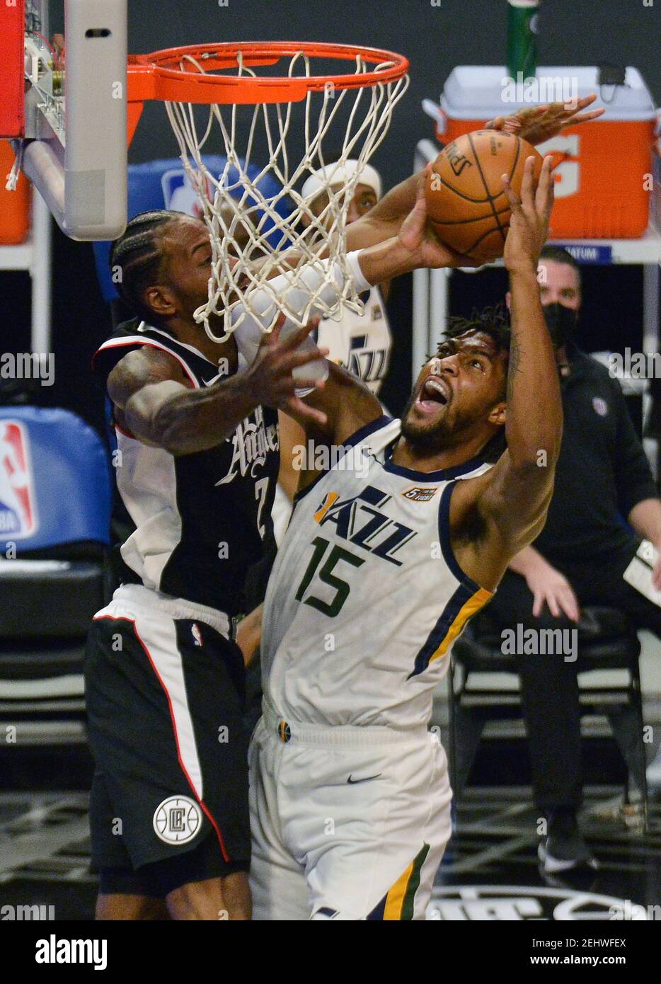 Utah Jazz forward Derrick Favors scores over Los Angeles Clippers' forward Kawhi Leonard during the first half at Staples Center in Los Angeles on Friday, February 19, 2021. The Clippers defeated the Jazz 116-112.  Photo by Jim Ruymen/UPI Stock Photo
