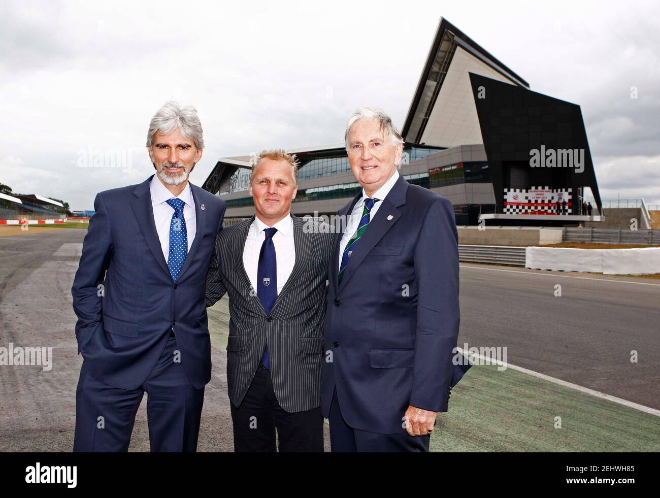 Formula One - F1 - Official launch of The Silverstone Wing  - The Silverstone Wing, Silverstone Circuit, Northamptonshire, NN12 8TN  - 17/5/11  Former Formula One Drivers Damon Hill (L), Johnny Herbert and John Watson (R)  Mandatory Credit: Action Images / Peter Cziborra  Livepic Stock Photo