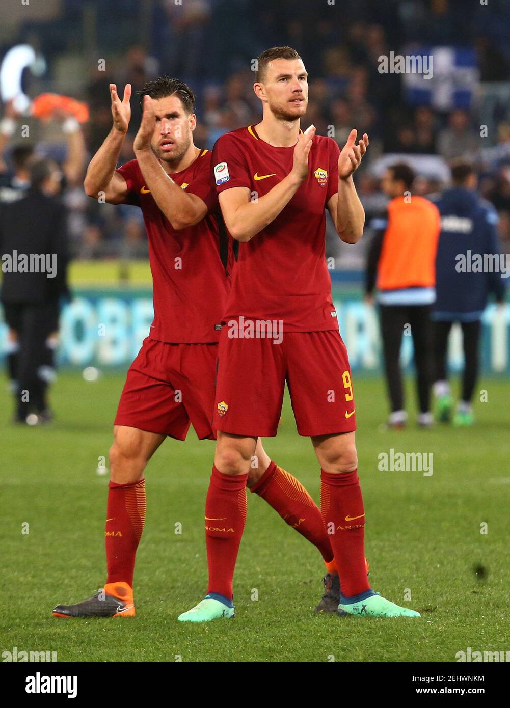 Soccer Football - Serie A - Lazio vs AS Roma - Stadio Olimpico, Rome, Italy - April 15, 2018   Roma's Edin Dzeko and Kevin Strootman applaud the fans at the end of the match    REUTERS/Alessandro Bianchi Stock Photo