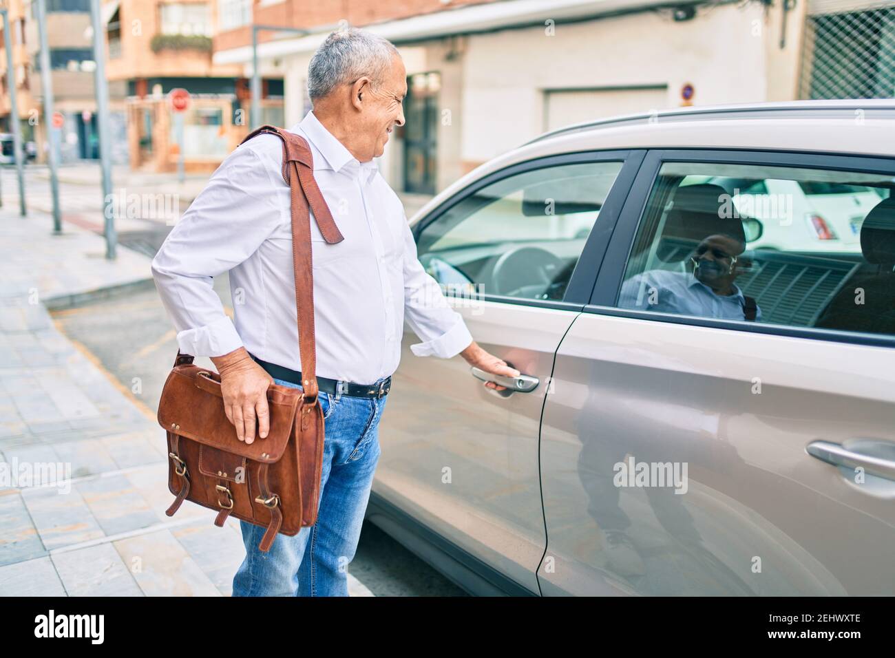 Portrait happy retired man opening hi-res stock photography and images ...