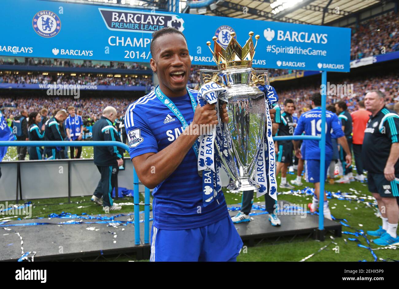 Football - Chelsea v Sunderland - Barclays Premier League - Stamford Bridge - 24/5/15 Chelsea's Didier Drogba celebrates with the trophy after winning the Barclays Premier League Action Images via Reuters / John Marsh Livepic EDITORIAL USE ONLY. No use with unauthorized audio, video, data, fixture lists, club/league logos or 'live' services. Online in-match use limited to 45 images, no video emulation. No use in betting, games or single club/league/player publications.  Please contact your account representative for further details. Stock Photo