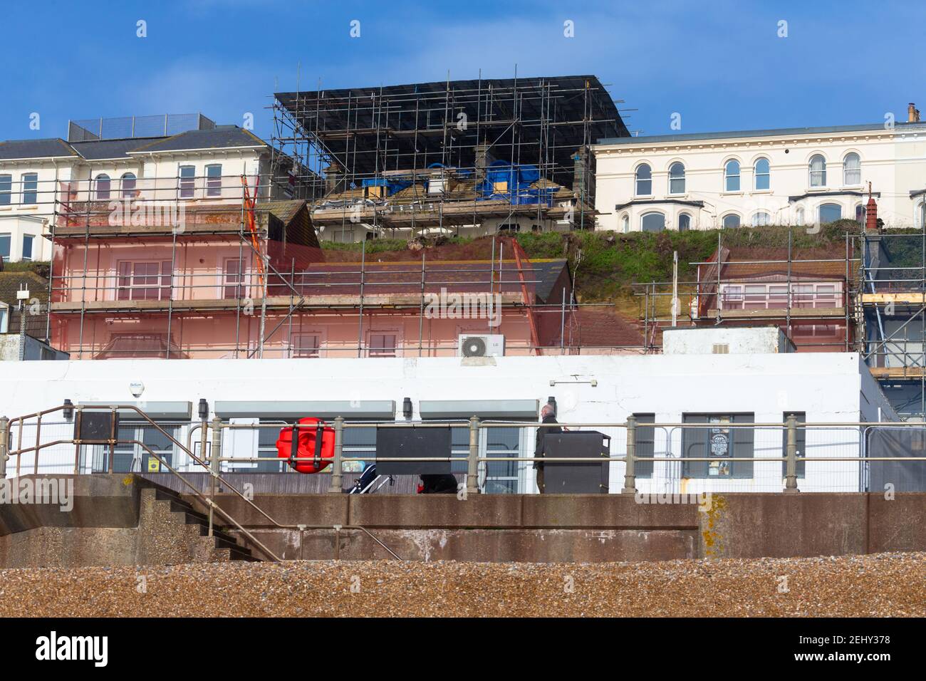 Roof scaffolding on a large seafront building, hastings, east sussex, uk Stock Photo