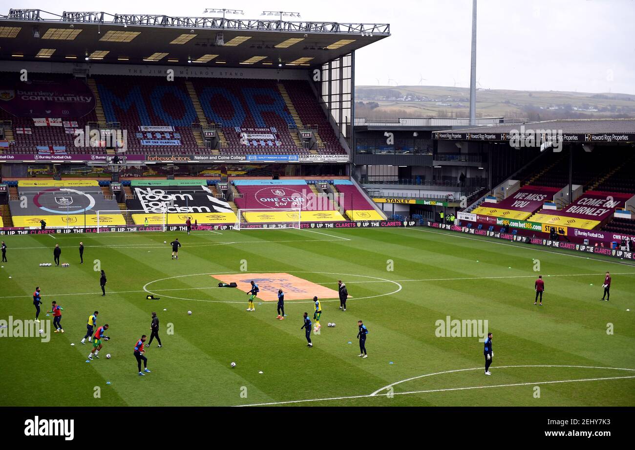 The players warm up on the pitch ahead of the Premier League match at Turf Moor, Burnley. Picture date: Saturday February 20, 2021. Stock Photo