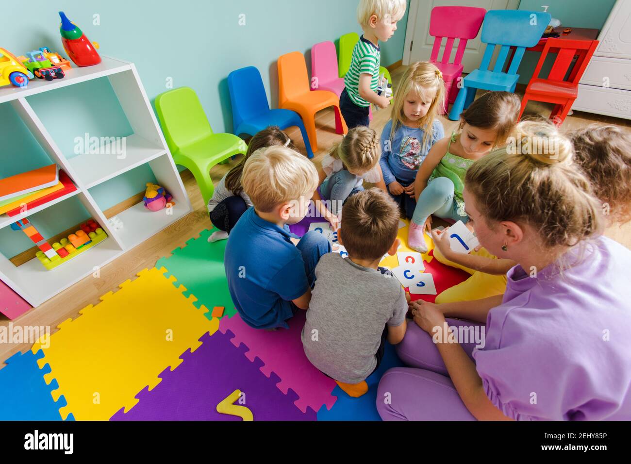 Educational group activity at the kindergarten or daycare Stock Photo