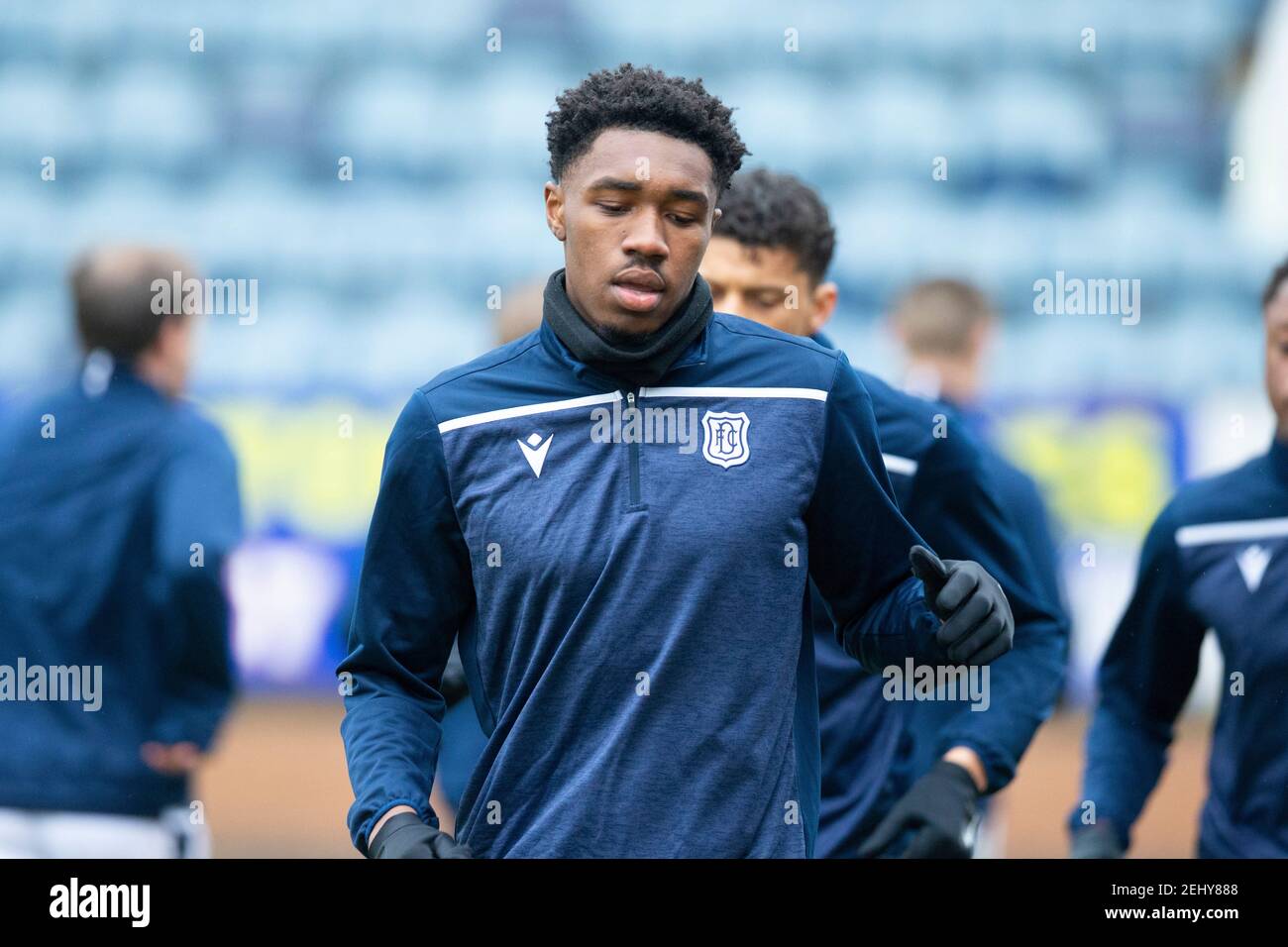Dens Park, Dundee, UK. 20th Feb, 2021. Scottish Championship Football, Dundee FC versus Queen of the South; Malachi Fagan-Walcott of Dundee during the warm up before the match Credit: Action Plus Sports/Alamy Live News Stock Photo