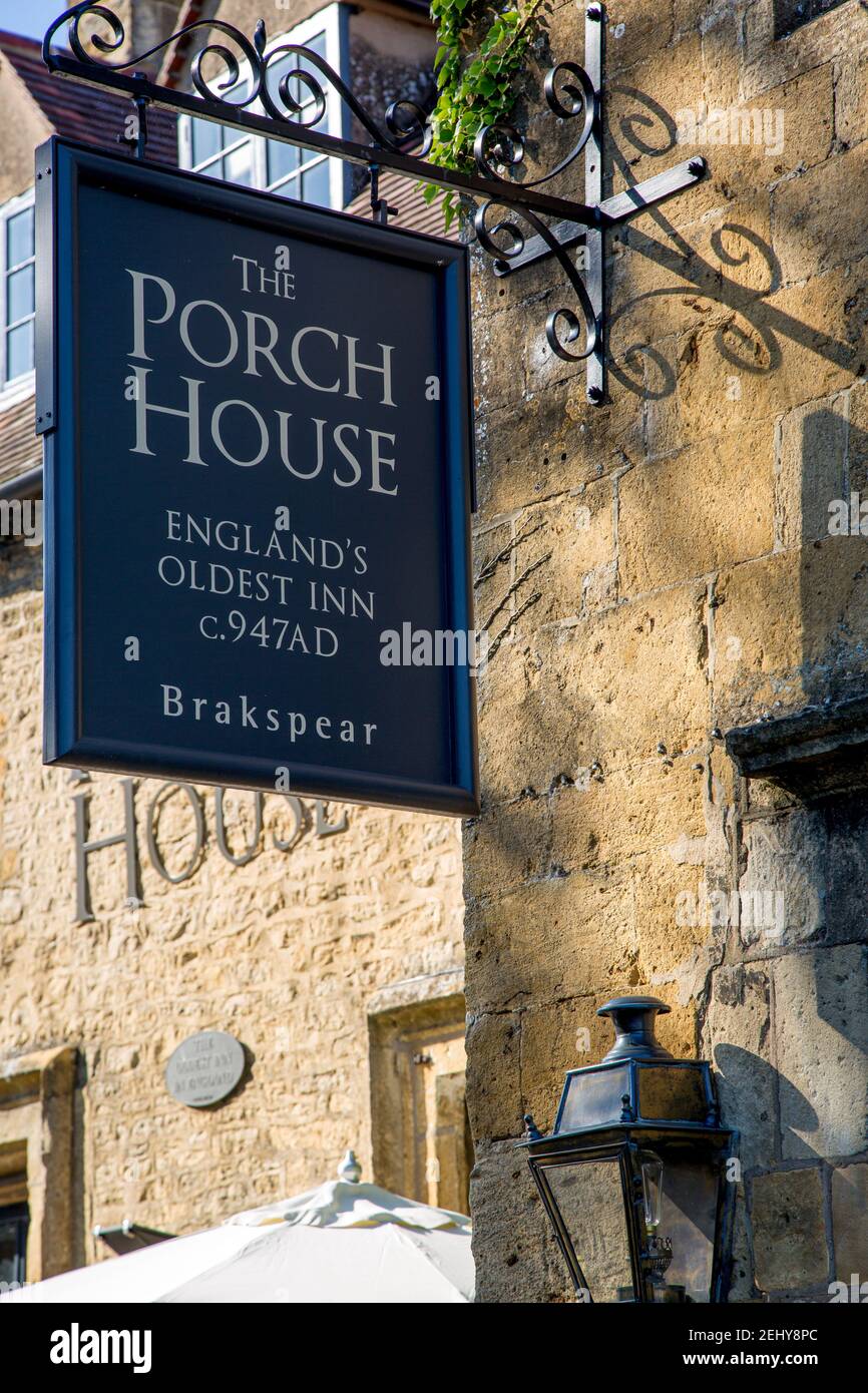 Exterior and sign to Porch House Pub and Inn - England's oldest c. 947AD, Stow-on-the-Wold, Gloucestershire, England, UK Stock Photo