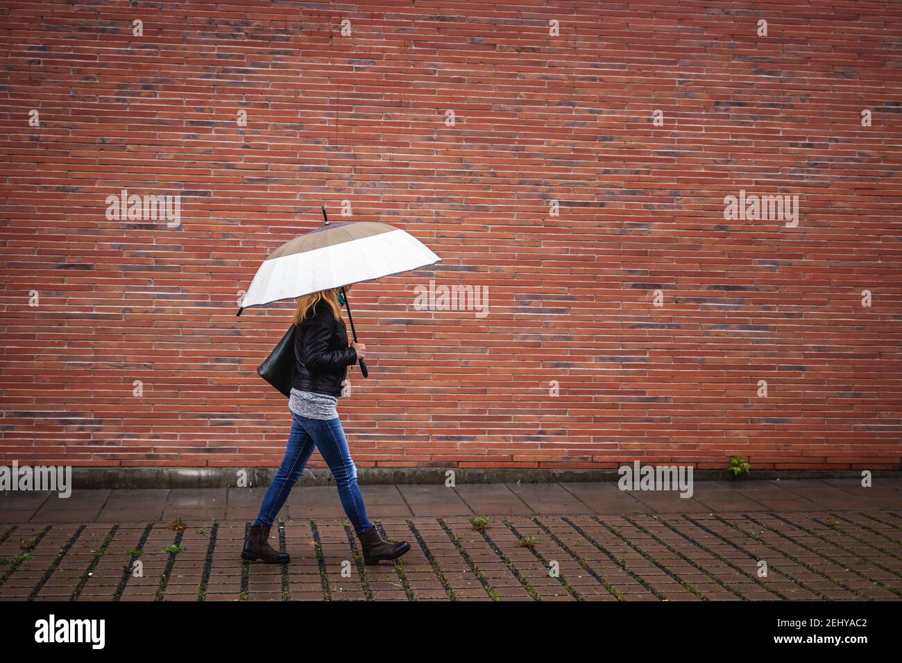 Pedestrian with red umbrella hi-res stock photography and images - Alamy
