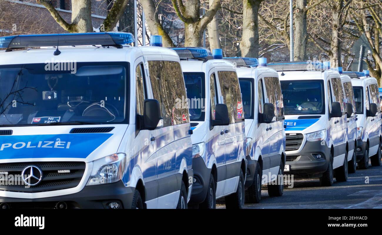 Hannover, Germany, February 14., 2021: German police blue and white vans  lined up on the side of the road Stock Photo - Alamy