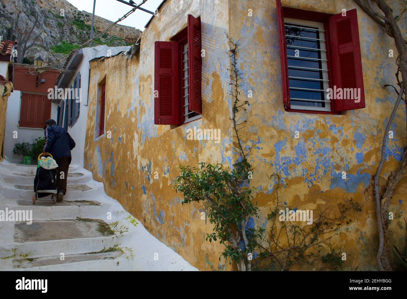 Colorful windows in a house in Anafiotika, traditional village in ...