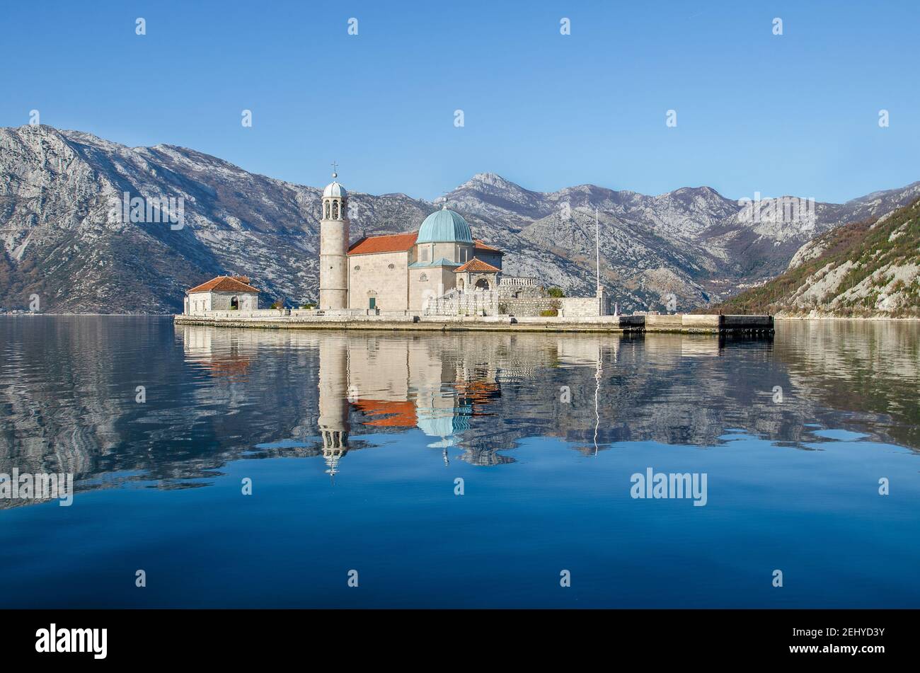 The church 'Our Lady of the Rocks' with mountain reflections, Bay of