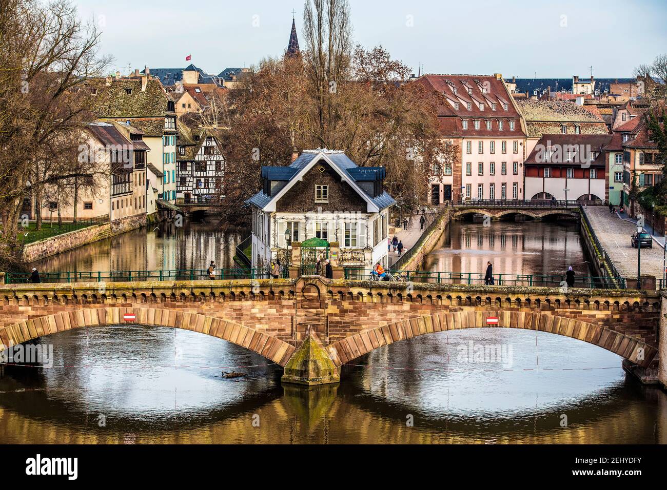 A Beautiful Bridge Over the River in Strasbourg With Apartments in the Background Stock Photo