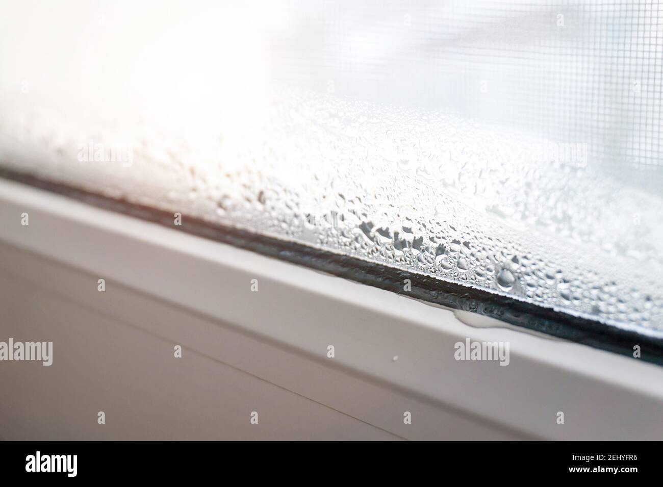 Condensation on PVC window Stock Photo