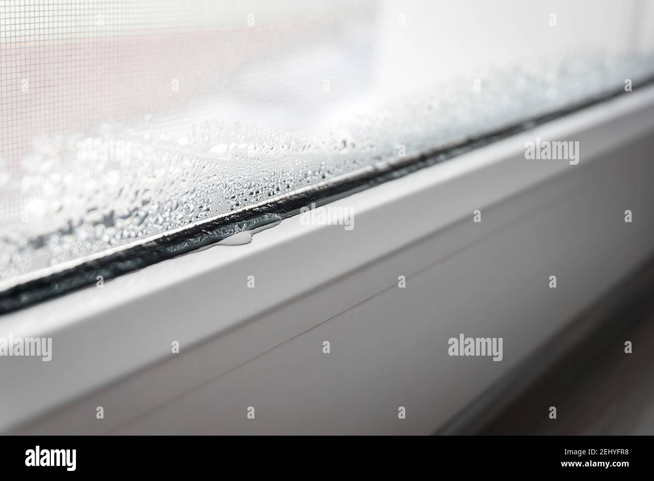 Condensation on PVC window Stock Photo