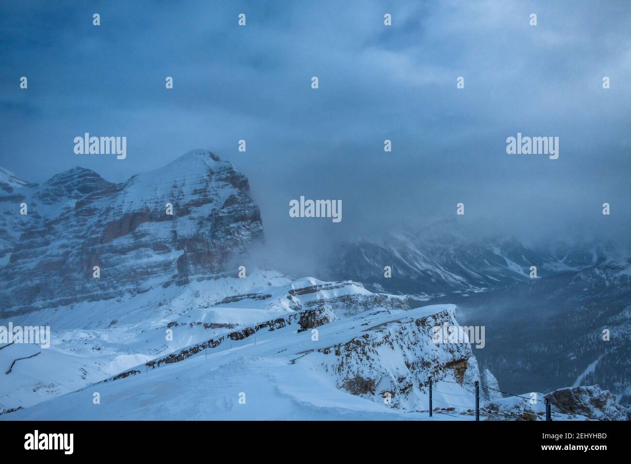Clouds carrying snow in the italian alps Stock Photo - Alamy