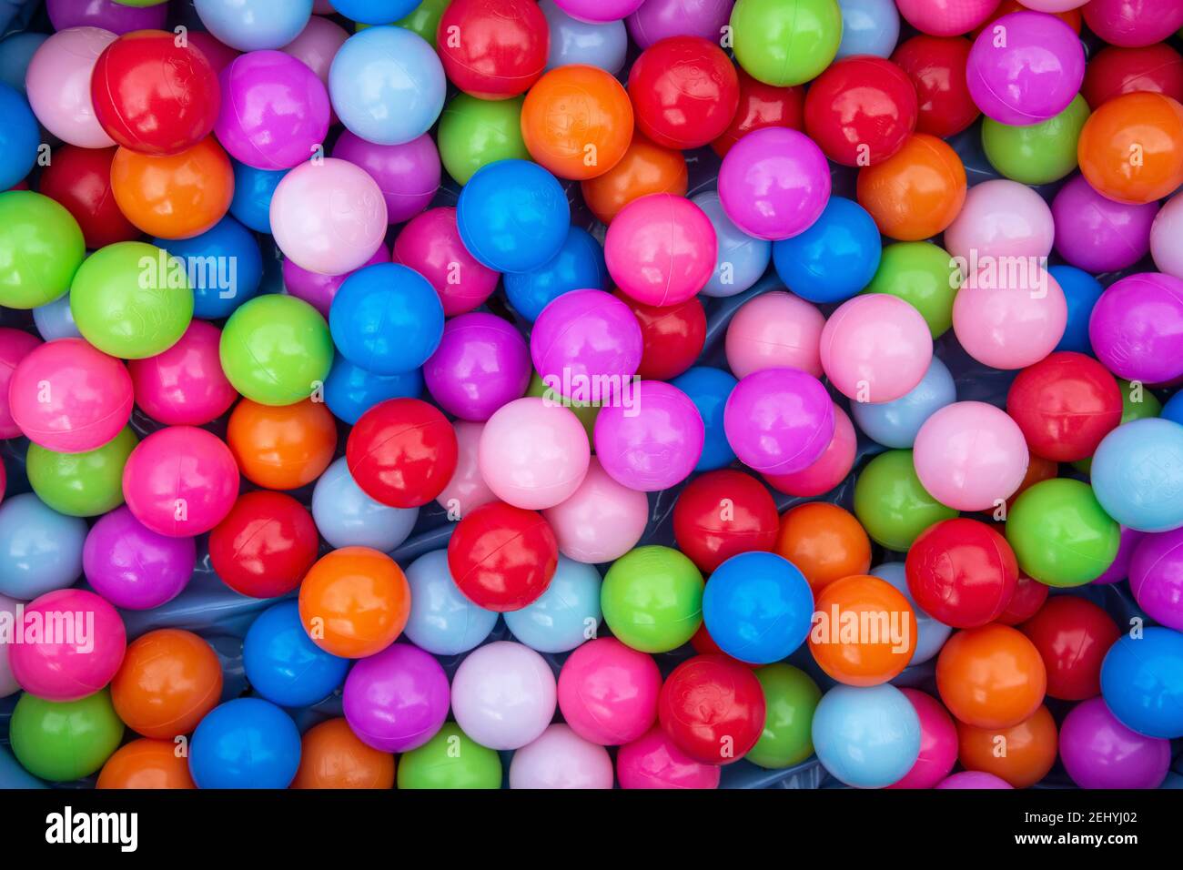 Colourful plastic children's balls for play pit, play tent, bath, bouncy house or pool Stock Photo