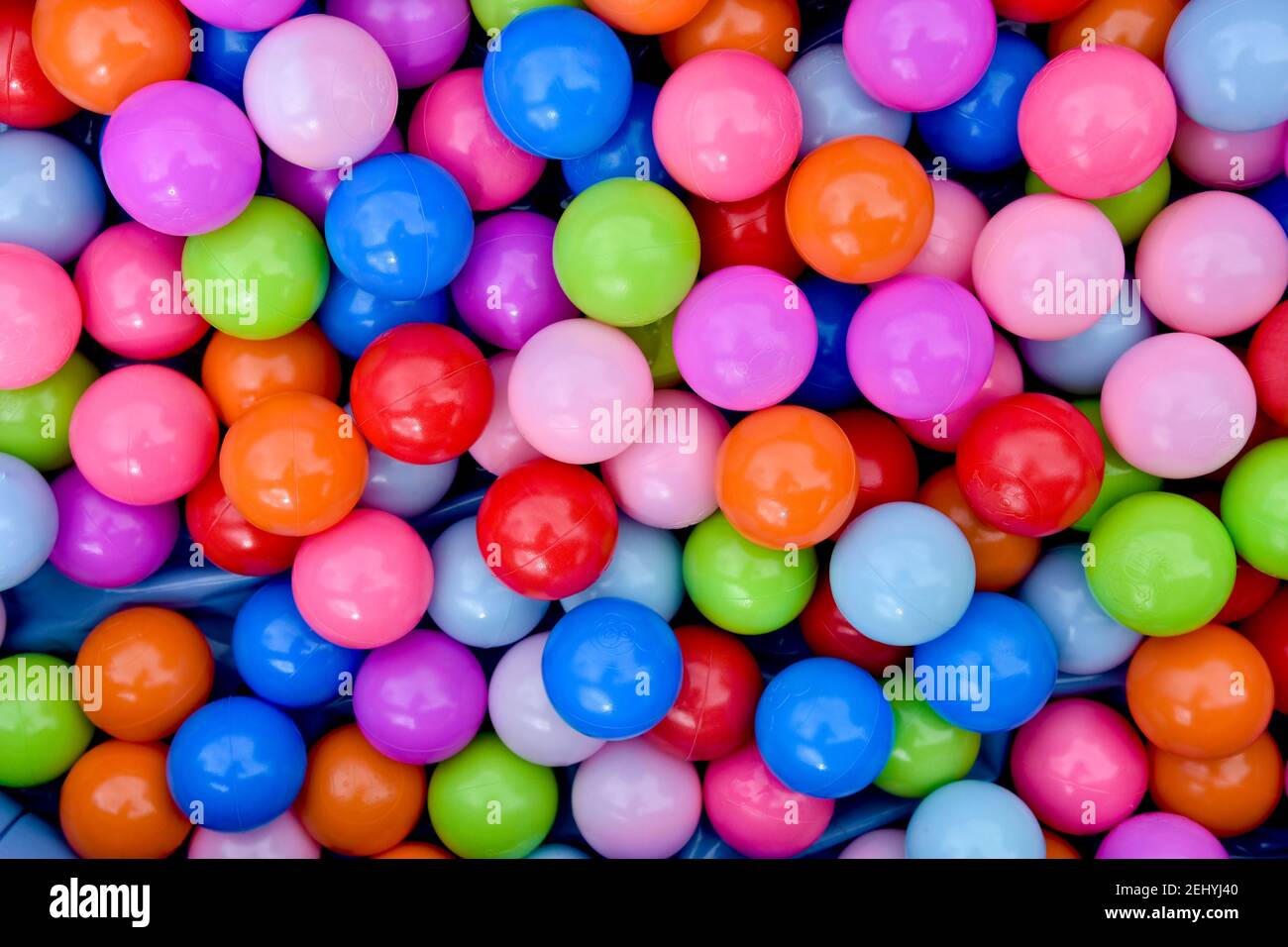 Colourful plastic children's balls for play pit, play tent, bath, bouncy house or pool Stock Photo