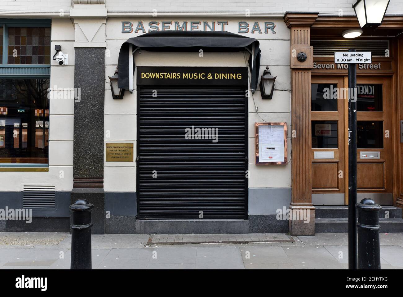 Soho, London, UK. 20th Feb 2021. People in Soho on a warm Saturday in lockdown with all none essential shops still closed. Credit: Matthew Chattle/Alamy Live News Stock Photo