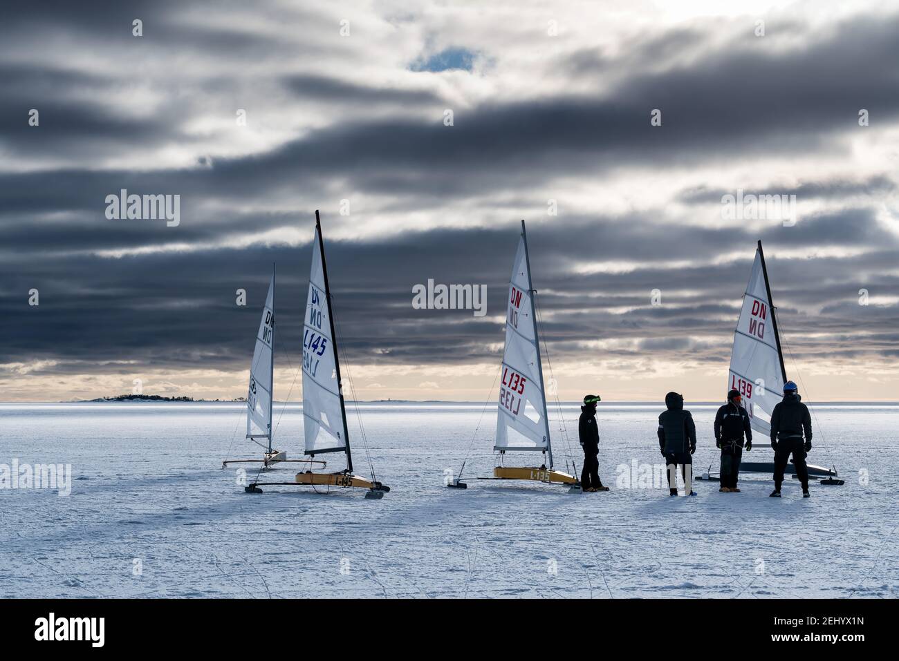 Ice sailing boats on frozen Baltic Sea ice in Espoo archipelago, Finland Stock Photo