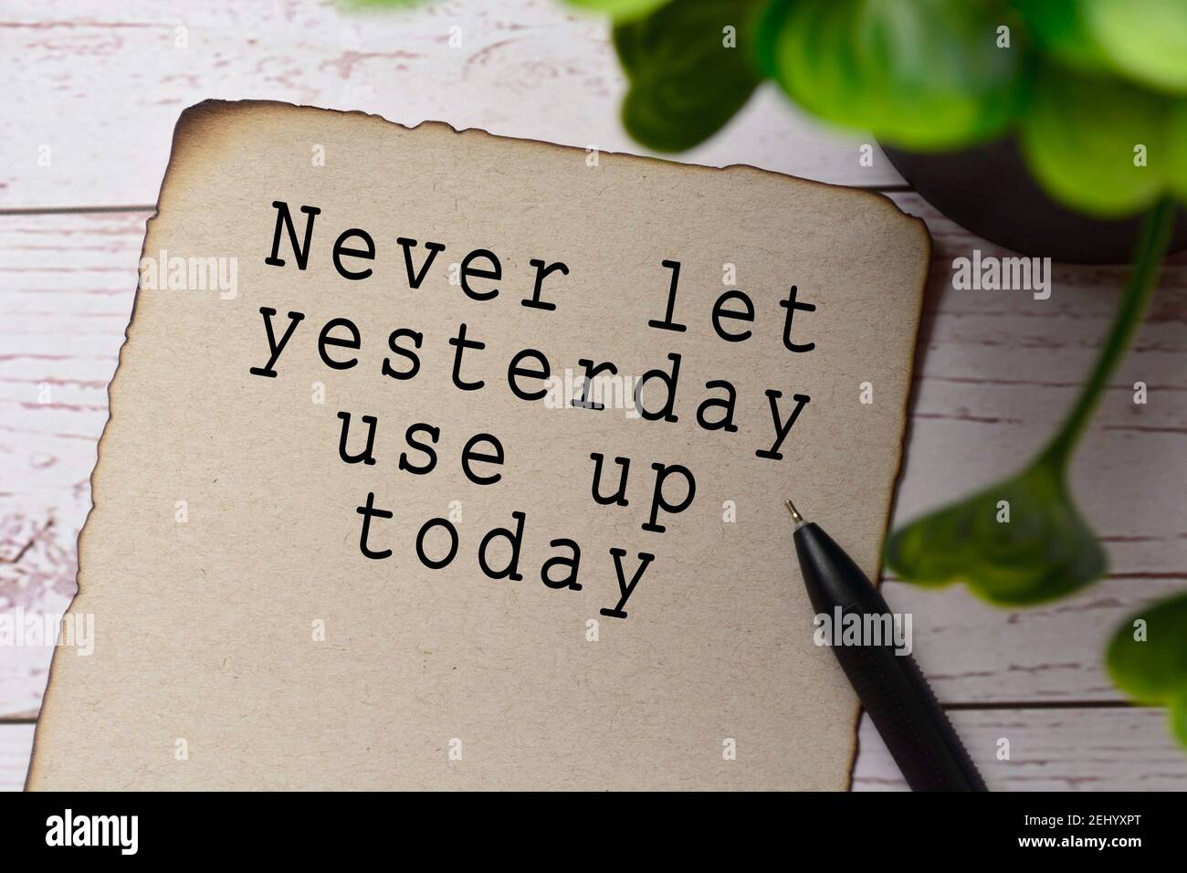 Motivational and inspirational quote on burnt edge brown paper with ...