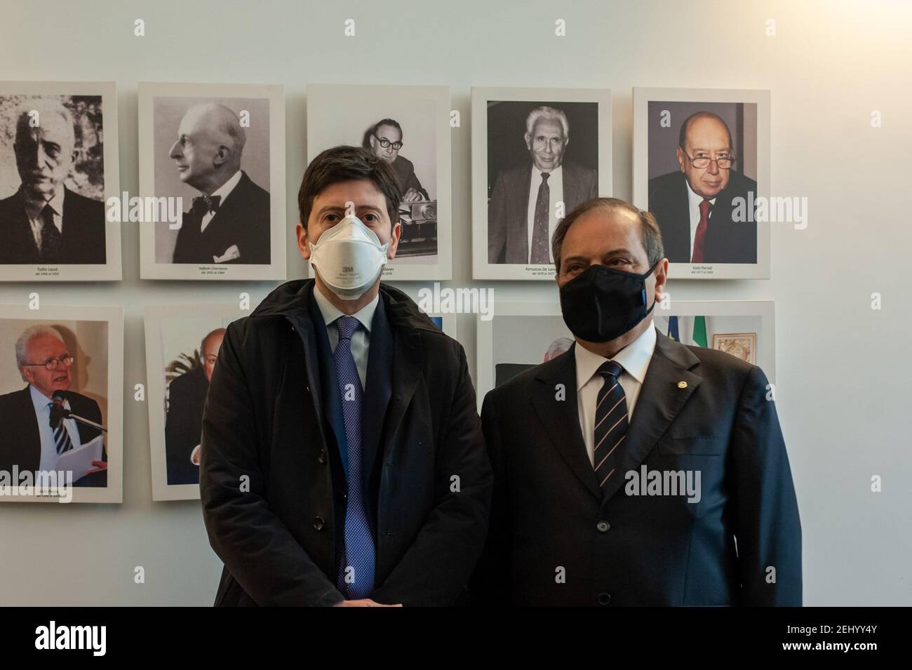 Roberto Speranza (c), Minister for Health, and Filippo Anelli (r), President FNOMCeO pose for a photo during the event.The National Federation of the Orders of Doctors and Dental Surgeons (FNOMCeO) celebrated the National Day of Healthcare Workers, Healthcare Members, Assistance Workers and Volunteers in Rome. The celebration is dedicated to the memory of doctors and dentists who died due to Covid-19 and it was going live at the Civic Hospital in Codogno and Berlin. Several authorities and celebrities like Maria Elisabetta Alberti Casellati, Italian Senate President; Roberto Fico, President of Stock Photo