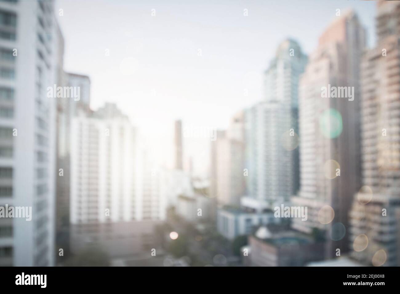 Abstract blur city estate building in morning view background. Cityscape  skyline from top office window view. Blurred shine bokeh real architecture  mo Stock Photo - Alamy