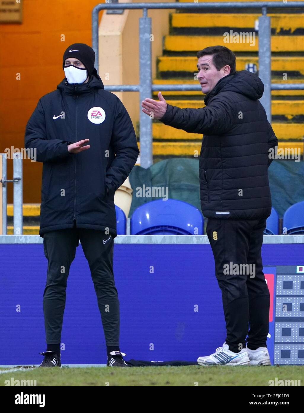 Mansfield Town manager Nigel Clough argues with the fourth official during the Sky Bet League Two match at the One Call Stadium, Mansfield. Picture date: Saturday February 20, 2021. Stock Photo