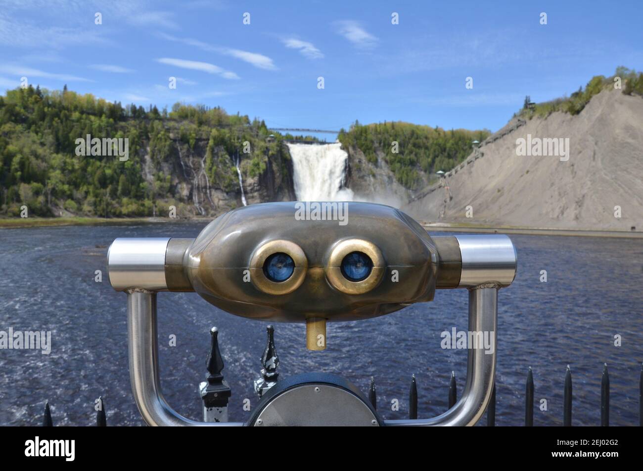 binoculars or view finder and waterfall and water in Quebec, Canada Stock Photo