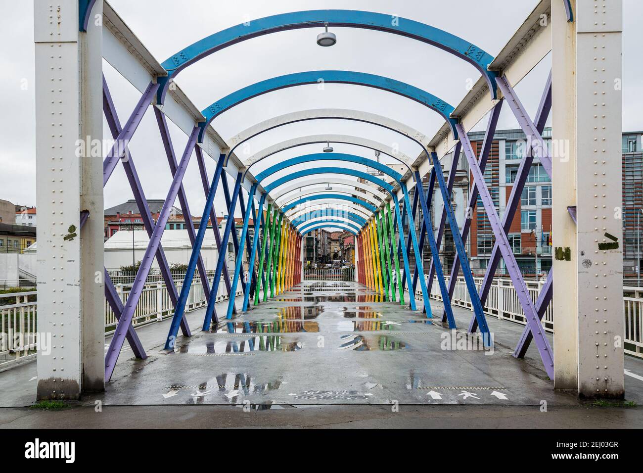 Colorful Bridge joining Niemeyer Center with the old town of Aviles, Spain Stock Photo