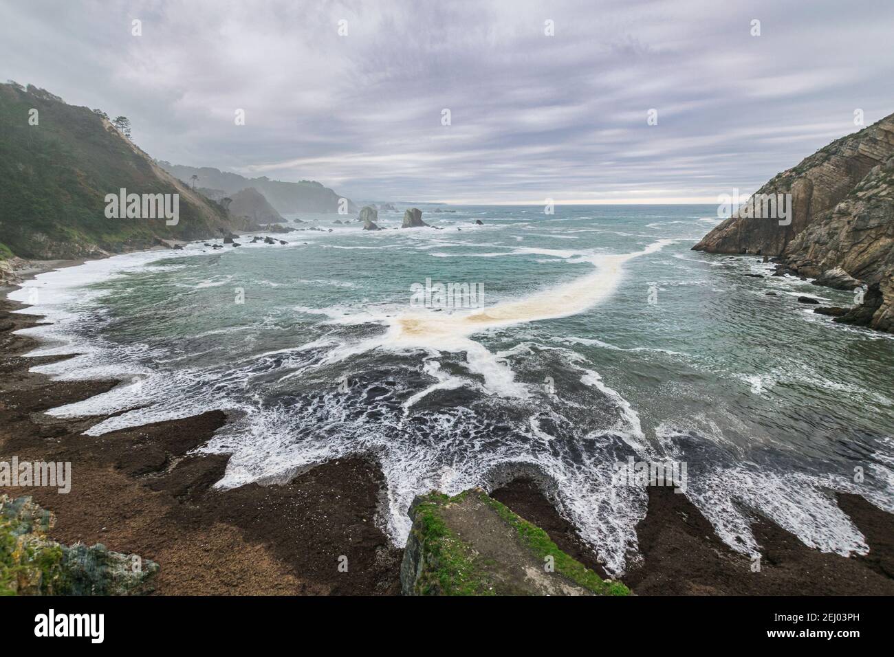 Playa del Silencio (Beach of Silence) during low tide, located near the fishing village of Cudillero in Asturias, Spain. Beautiful seascape on an over Stock Photo