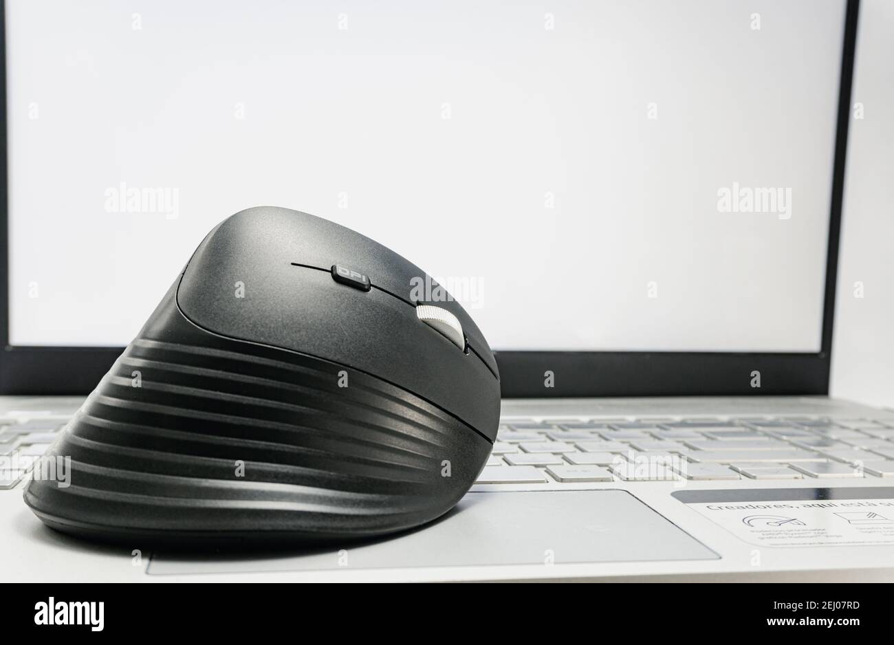 vertical mouse on top of a modern computer. mouse for gamers, mouse for