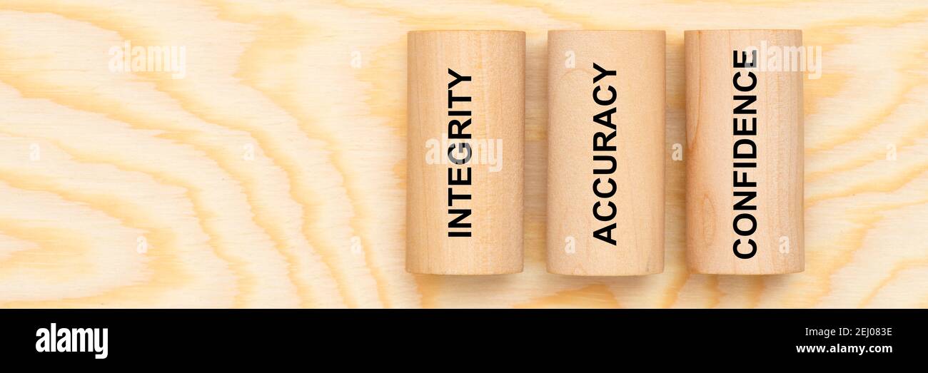 integrity, accuray and confidence printed on three pillars Stock Photo