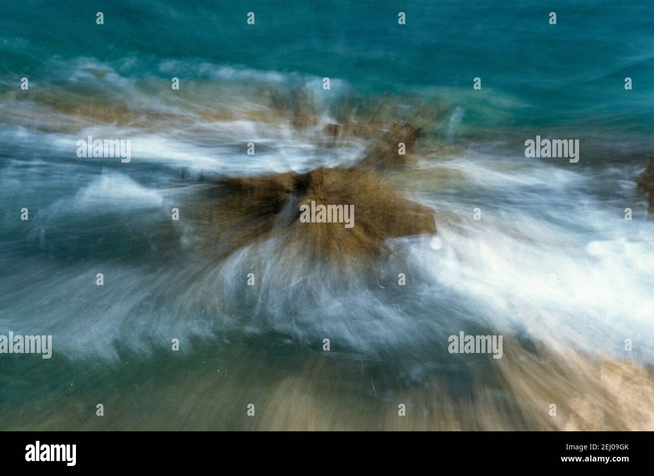 Waves Crashing against Rocks Stock Photo