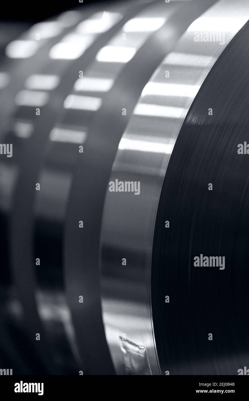 aluminum strips wound on coils, industrial background photo Stock Photo