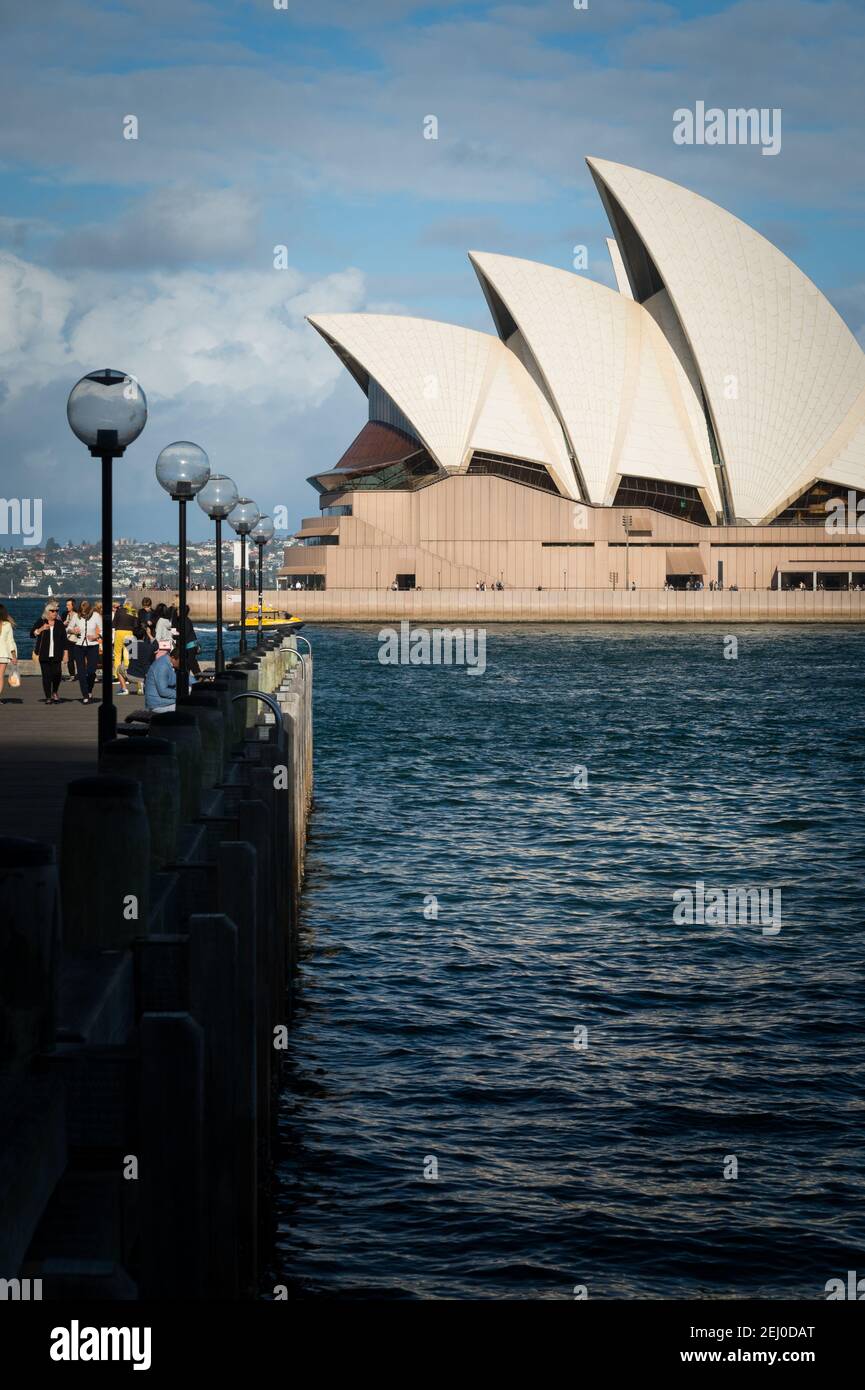 The Sydney Opera House and The Rocks, Bennelong Point, Sydney, New South Wales, Australia. Stock Photo