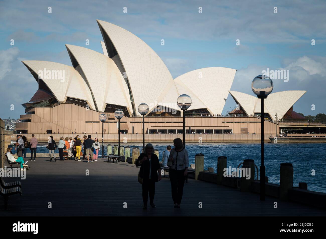 The Sydney Opera House and The Rocks, Bennelong Point, Sydney, New South Wales, Australia. Stock Photo