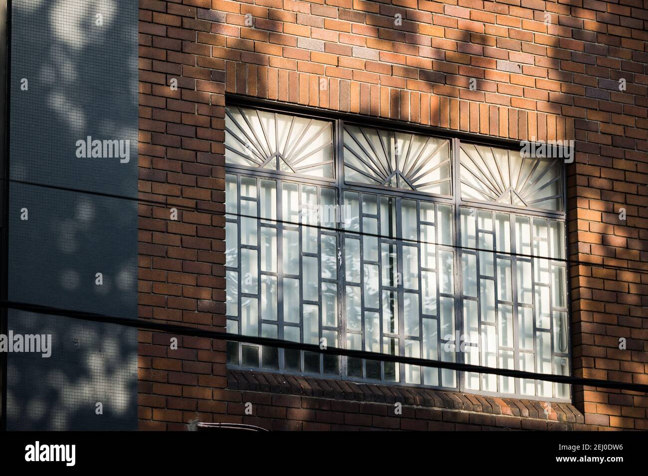 Shadows on buildings on Chippen Street, Sydney, New South Wales, Australia. Stock Photo