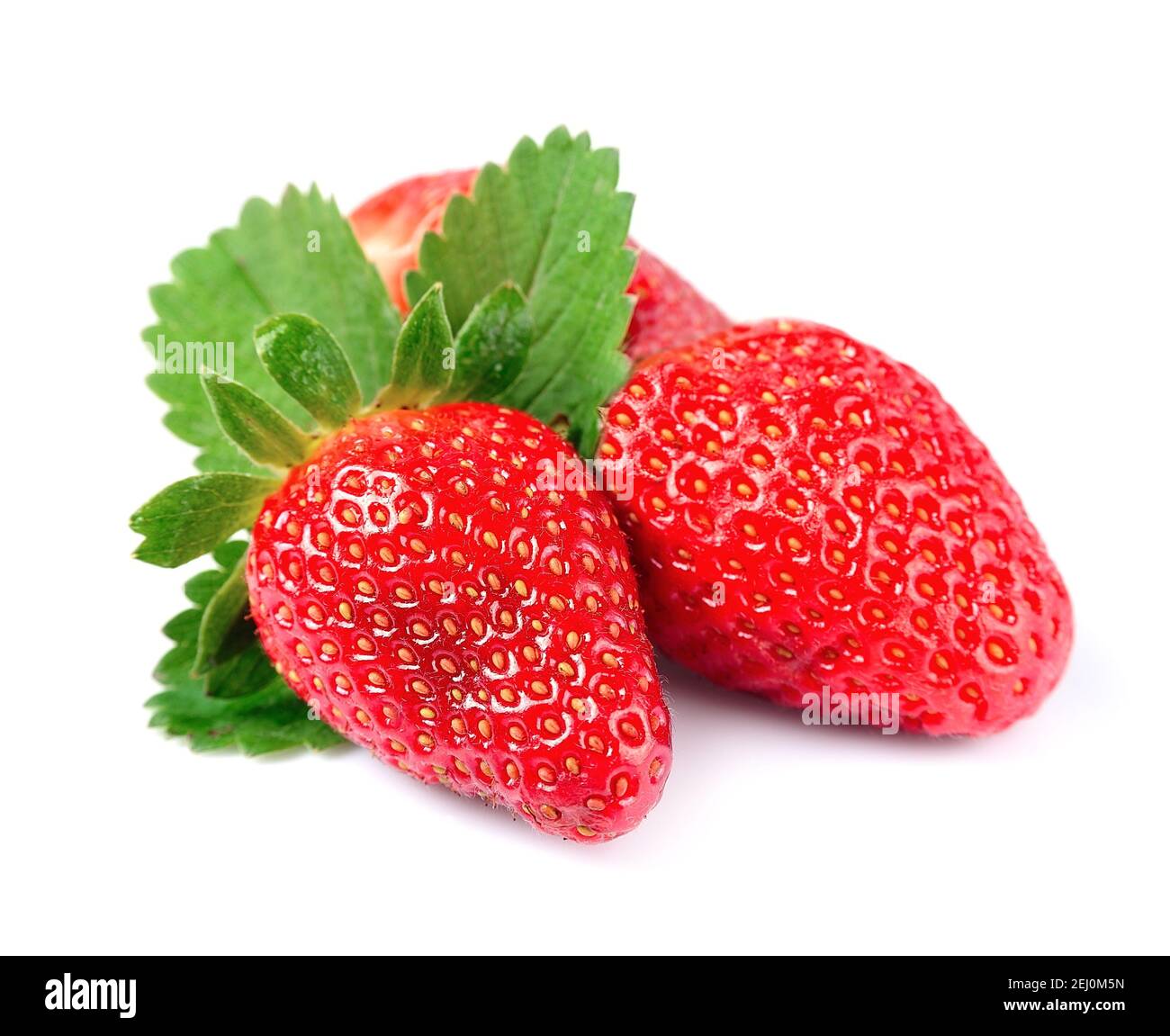 Ripe strawberry with leaves on white background Stock Photo - Alamy