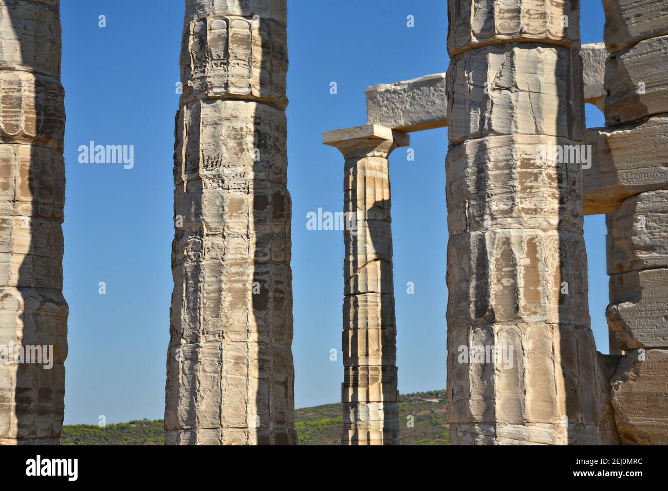 Marble columns view of the ancient Greek Doric style Temple of Poseidon ...