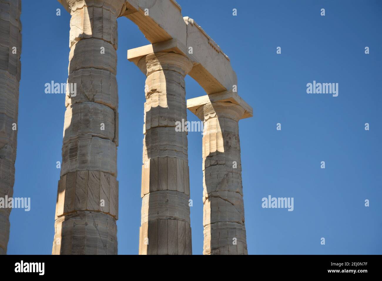 Marble columns view of the ancient Greek Doric style Temple of Poseidon ...