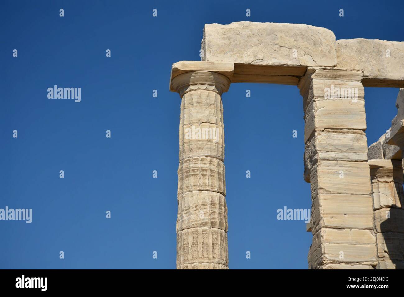 Marble columns view of the ancient Greek Doric style Temple of Poseidon ...