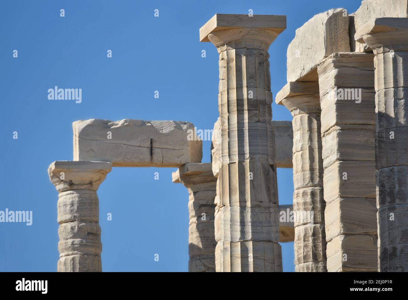 Marble columns view of the ancient Greek Doric style Temple of Poseidon ...