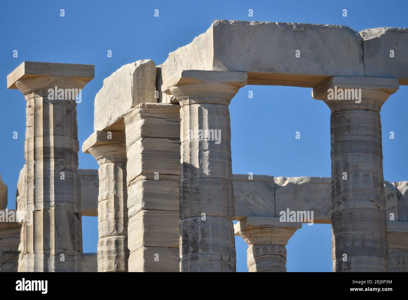 Marble columns view of the ancient Greek Doric style Temple of Poseidon ...