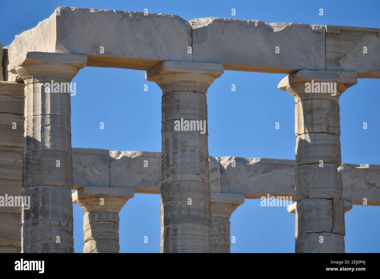 Marble columns view of the ancient Greek Doric style Temple of Poseidon ...