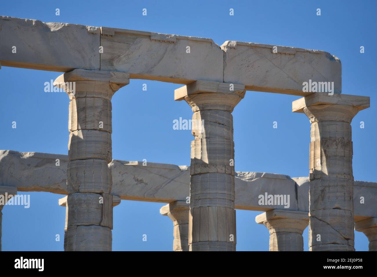 Marble columns view of the ancient Greek Doric style Temple of Poseidon ...