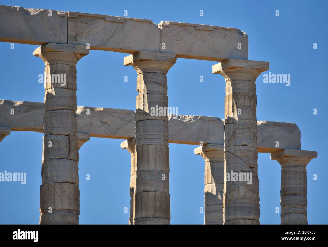 Marble columns view of the ancient Greek Doric style Temple of Poseidon ...