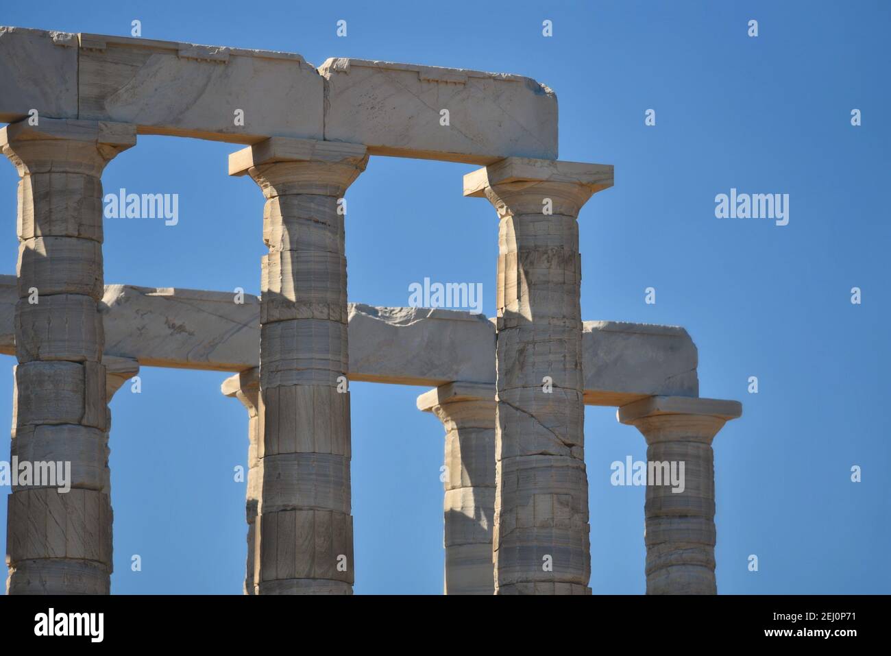 Marble columns view of the ancient Greek Doric style Temple of Poseidon ...