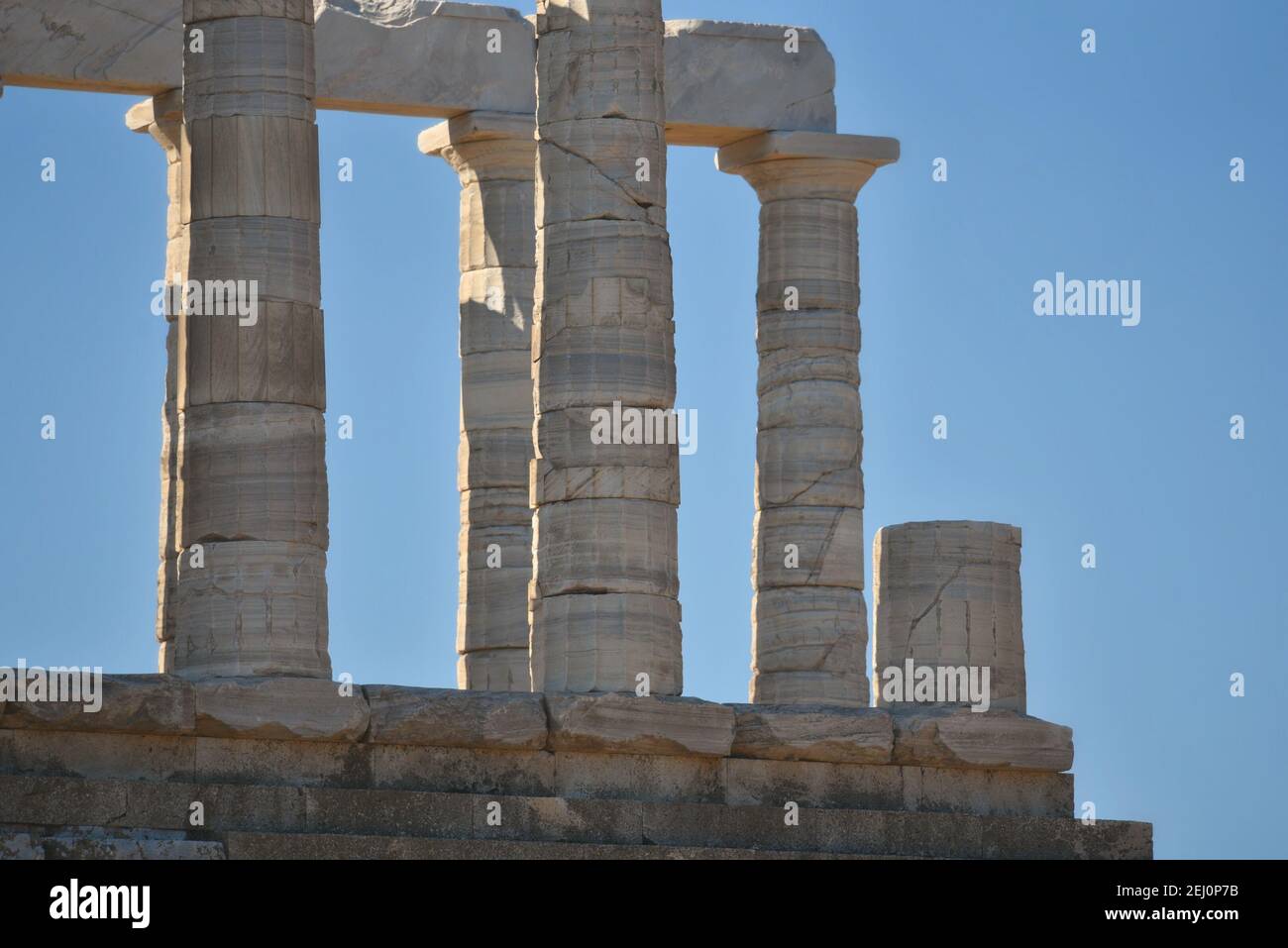 Marble columns view of the ancient Greek Doric style Temple of Poseidon ...