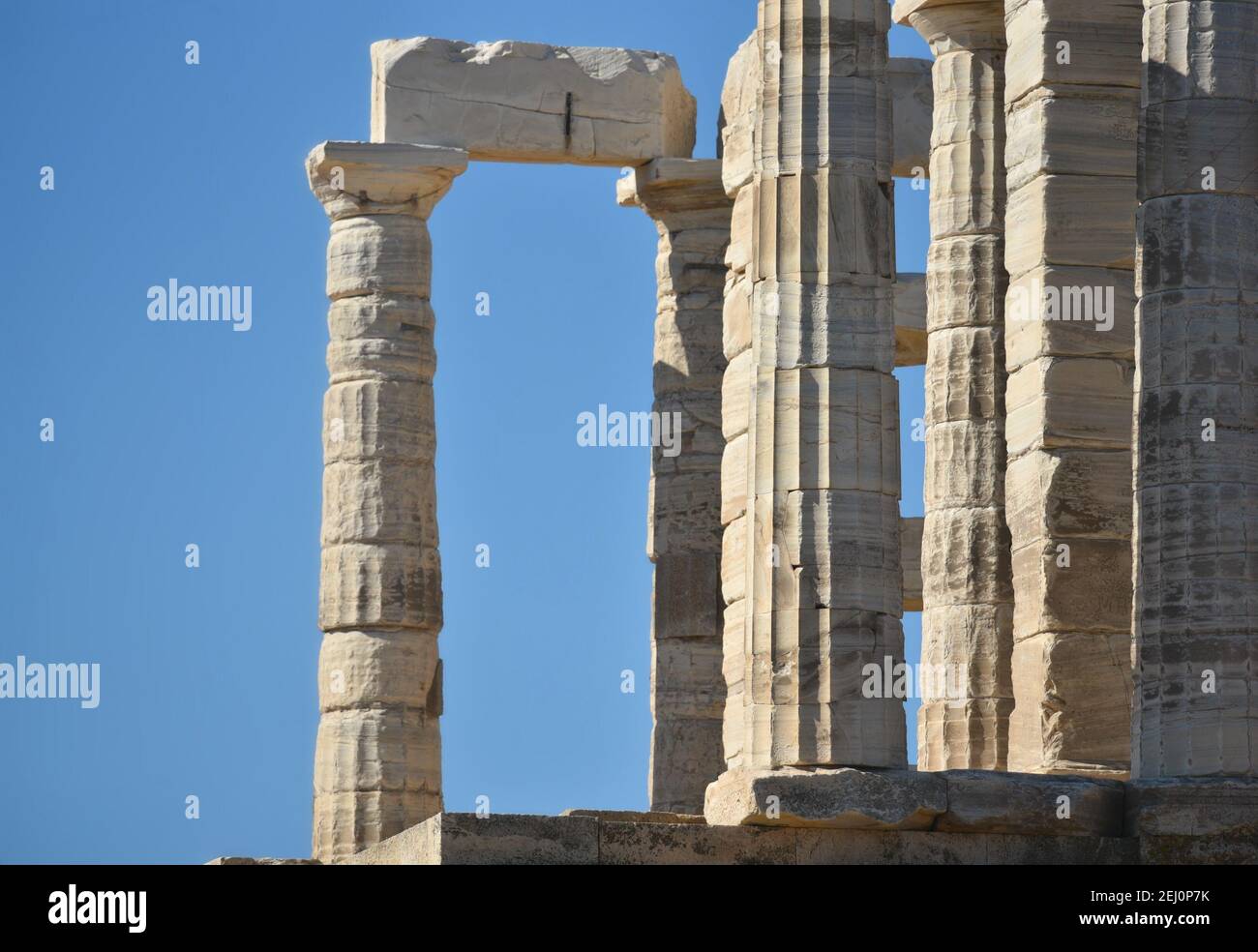 Marble columns view of the ancient Greek Doric style Temple of Poseidon ...